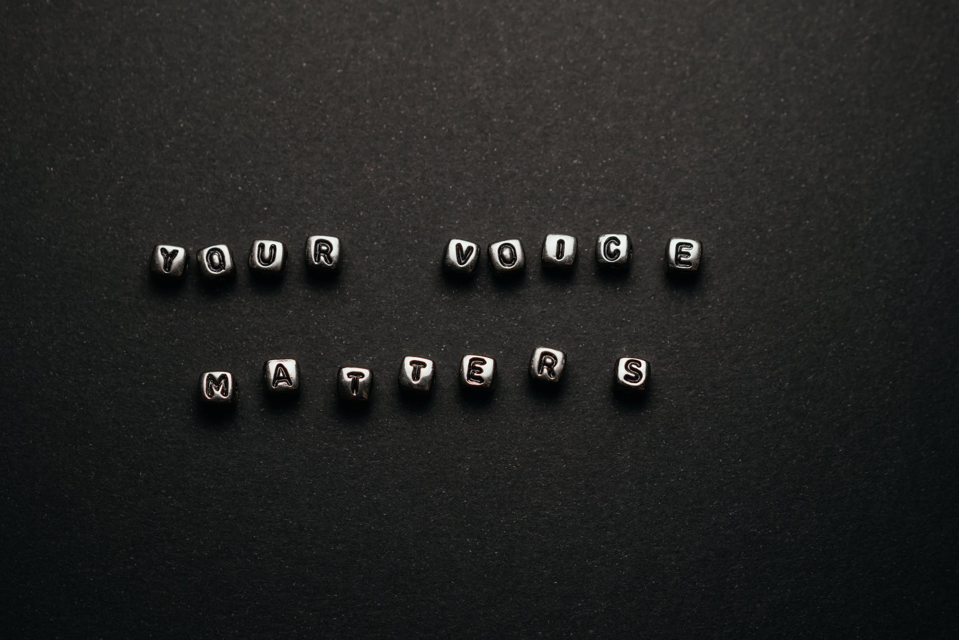 message spelled on letter cubes